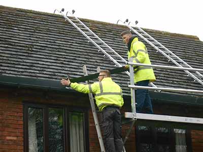 during-roof-cleaning during roof cleaning
