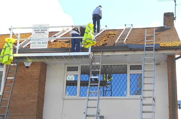 removing moss from an old roof